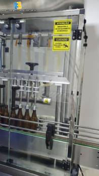 Envasadora linear com 4 bicos de envase Rotmaq